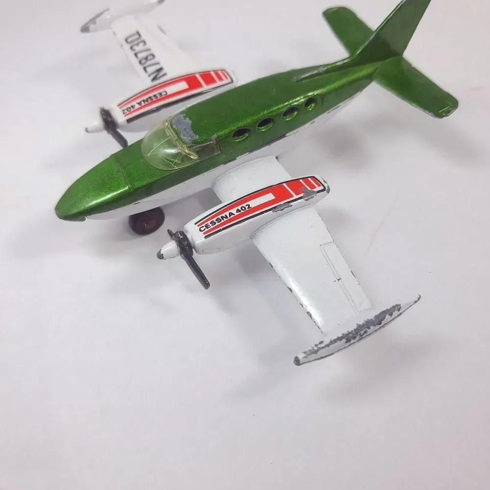 MATCHBOX Sky Busters 1974 SP9 Cessna 402 plane Airplane Macau Diecast green